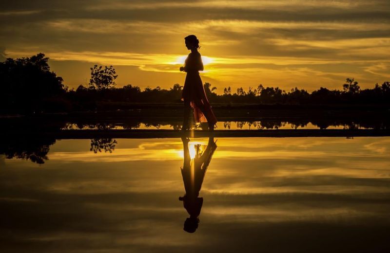 She brings past lessons—not past wounds