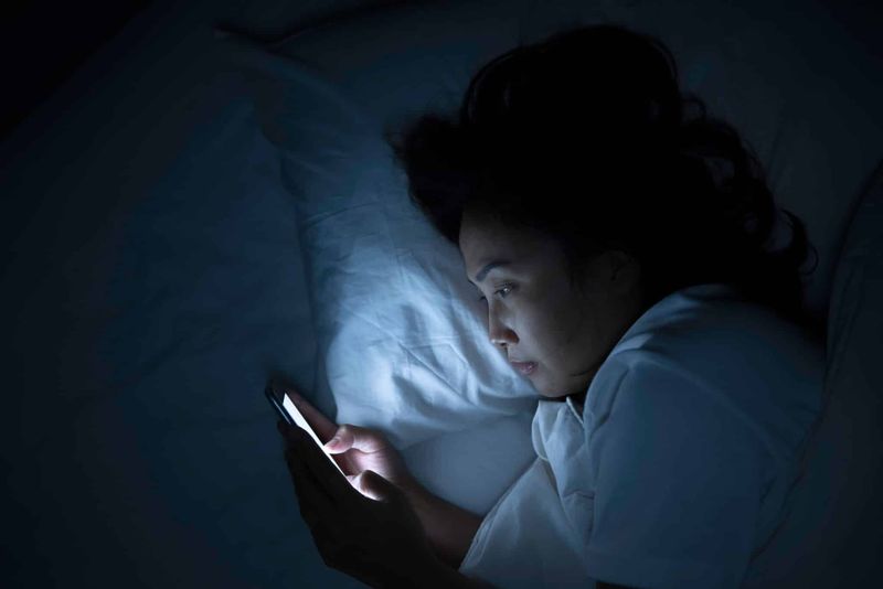 Acting Like Scrolling Your Phone Until 2AM Is “Winding Down”