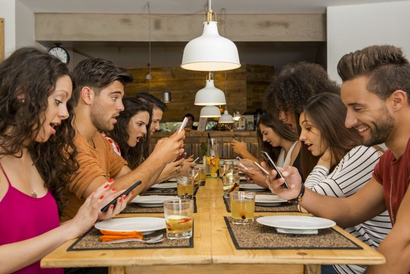 Using phones at the dinner table