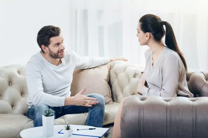 She listens to him with her full attention