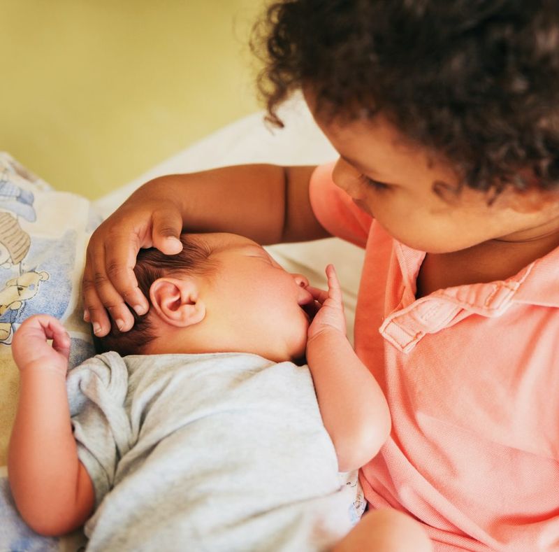 Seeing them comfort their younger siblings