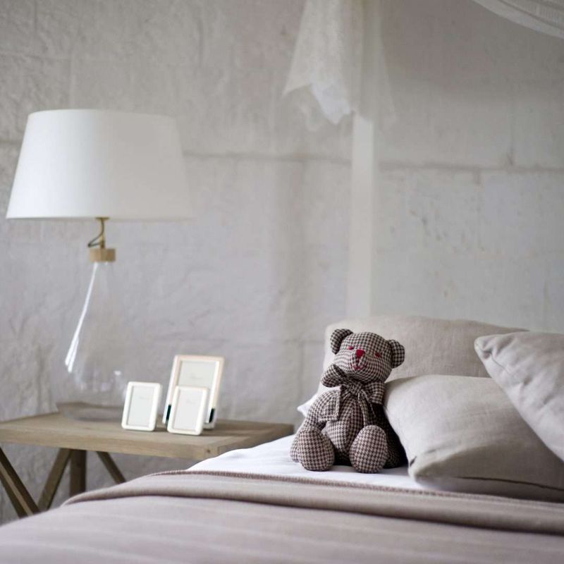 Childhood Stuffed Animals Still on the Bed